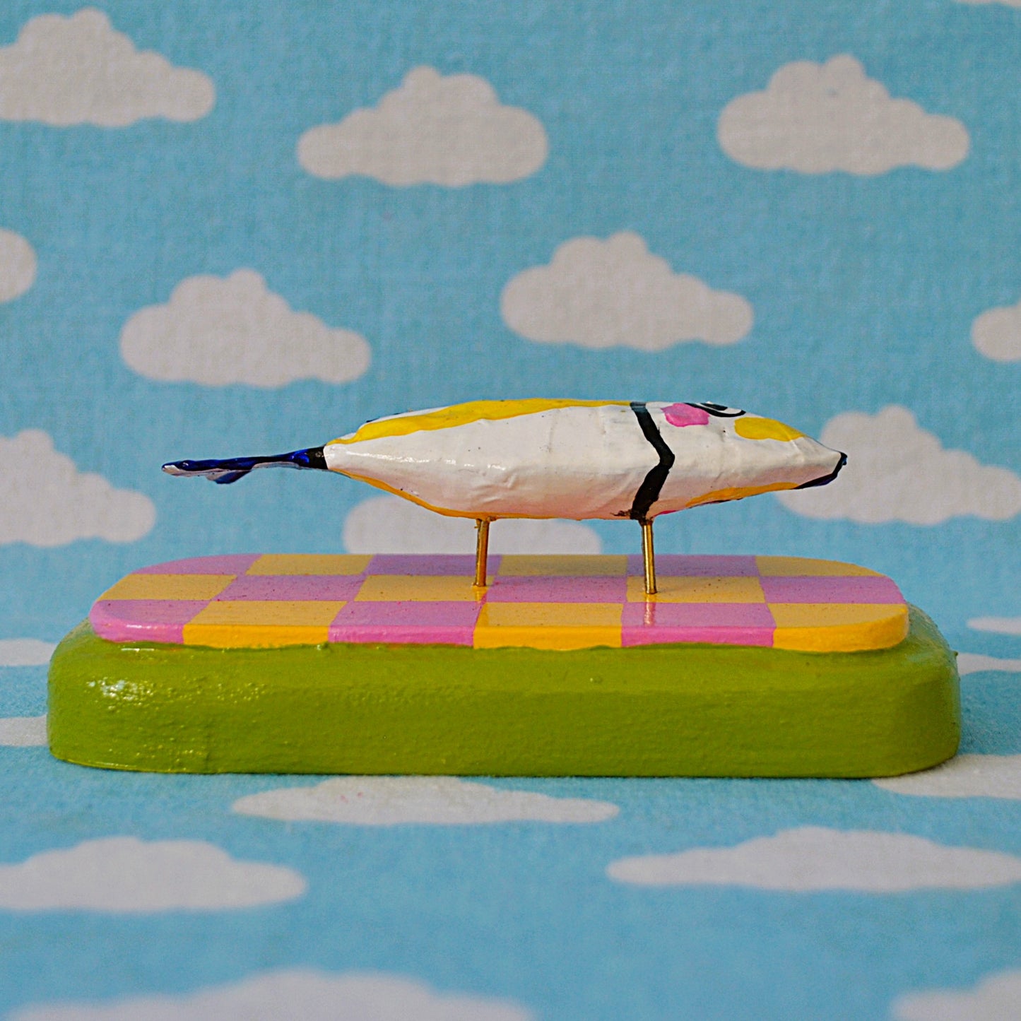 Sardine on Pink and Yellow Checker Board