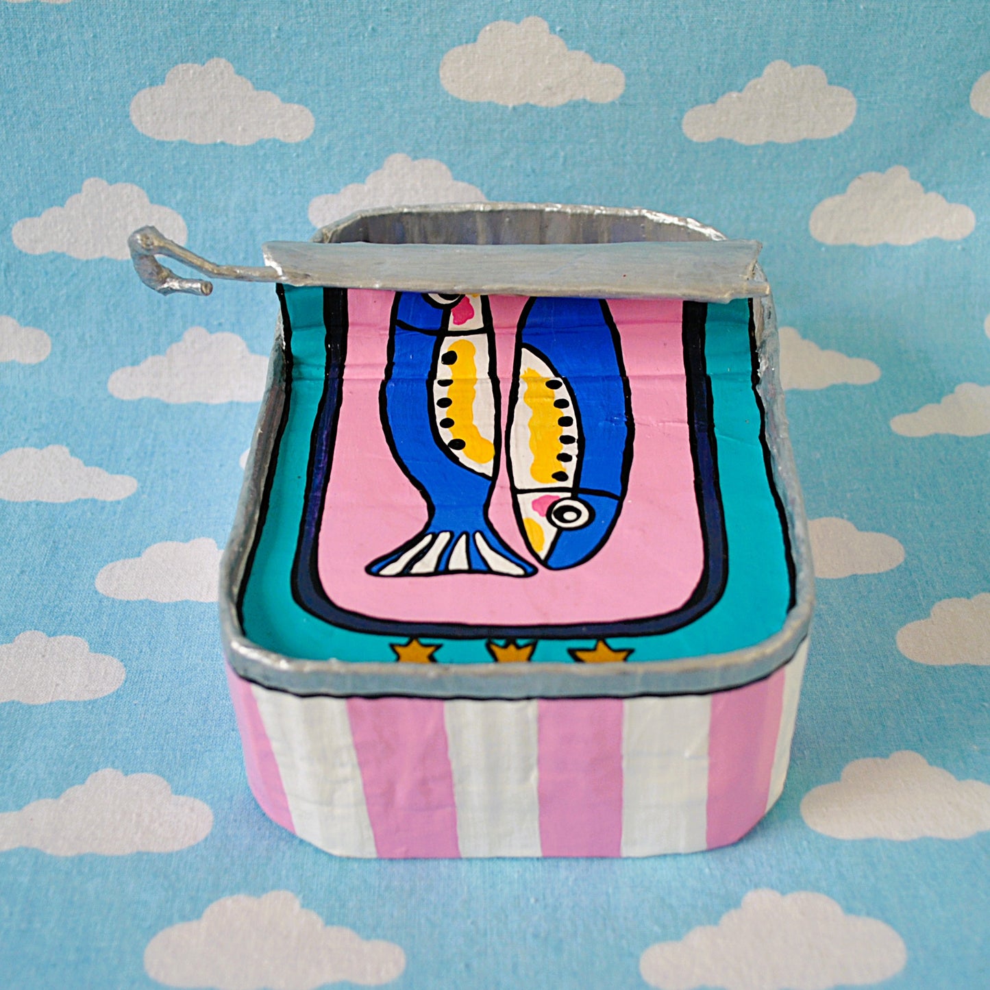 Sardines Tin on pink and teal