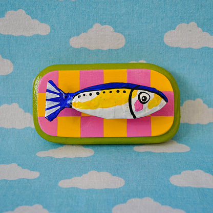 Sardine on Pink and Yellow Checker Board