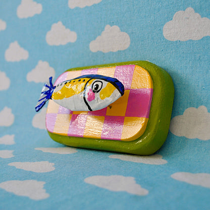 Sardine on Pink and Yellow Checker Board