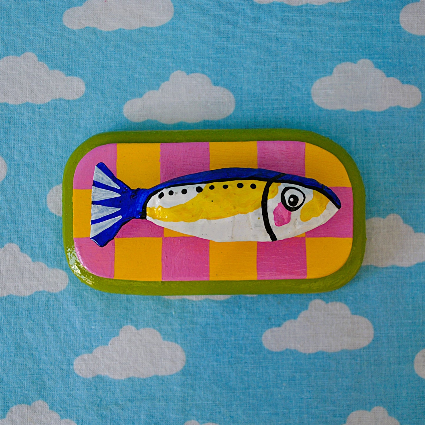 Sardine on Pink and Yellow Checker Board