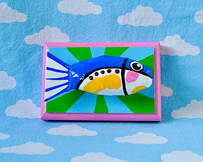 Sardine on green and blue