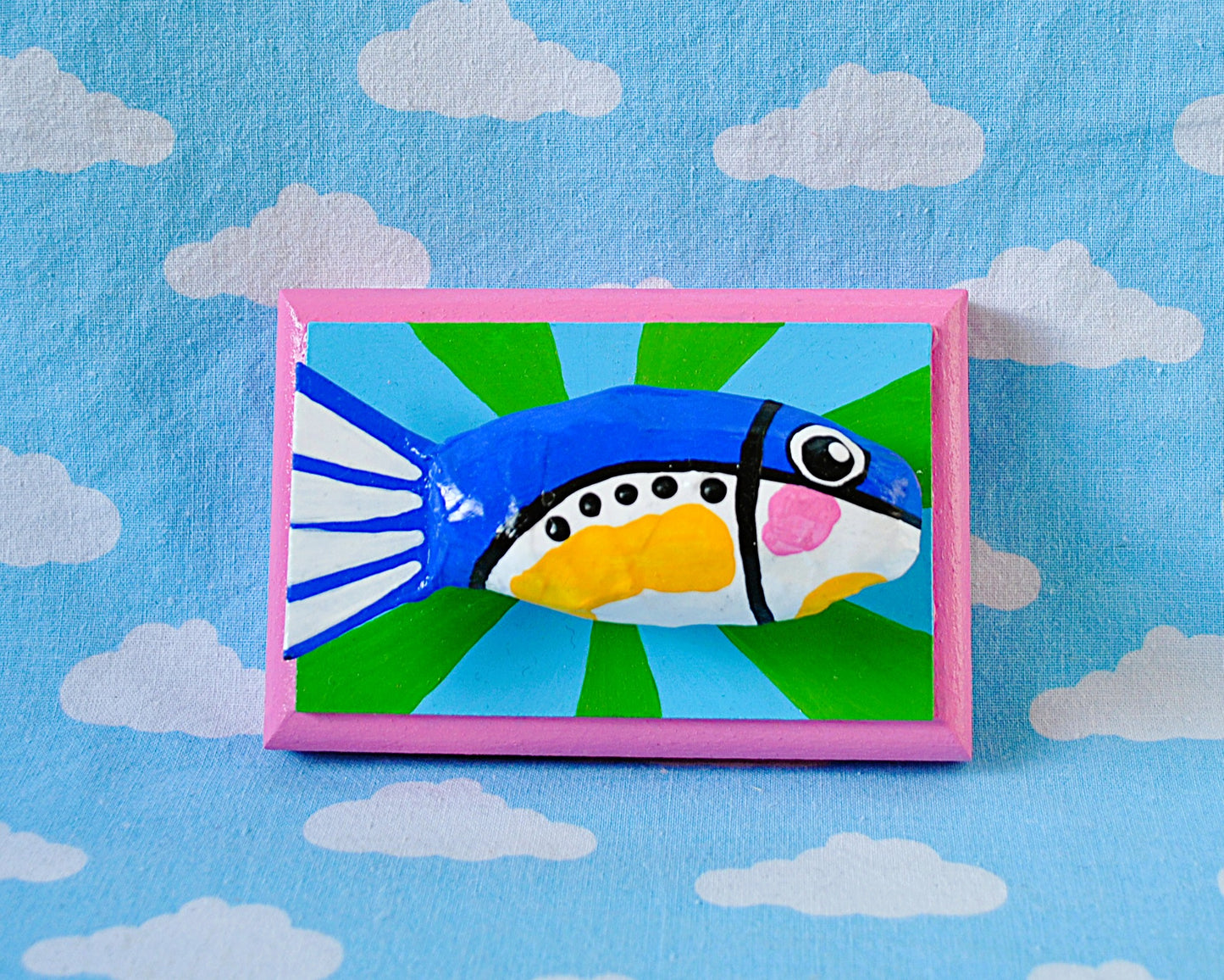 Sardine on green and blue