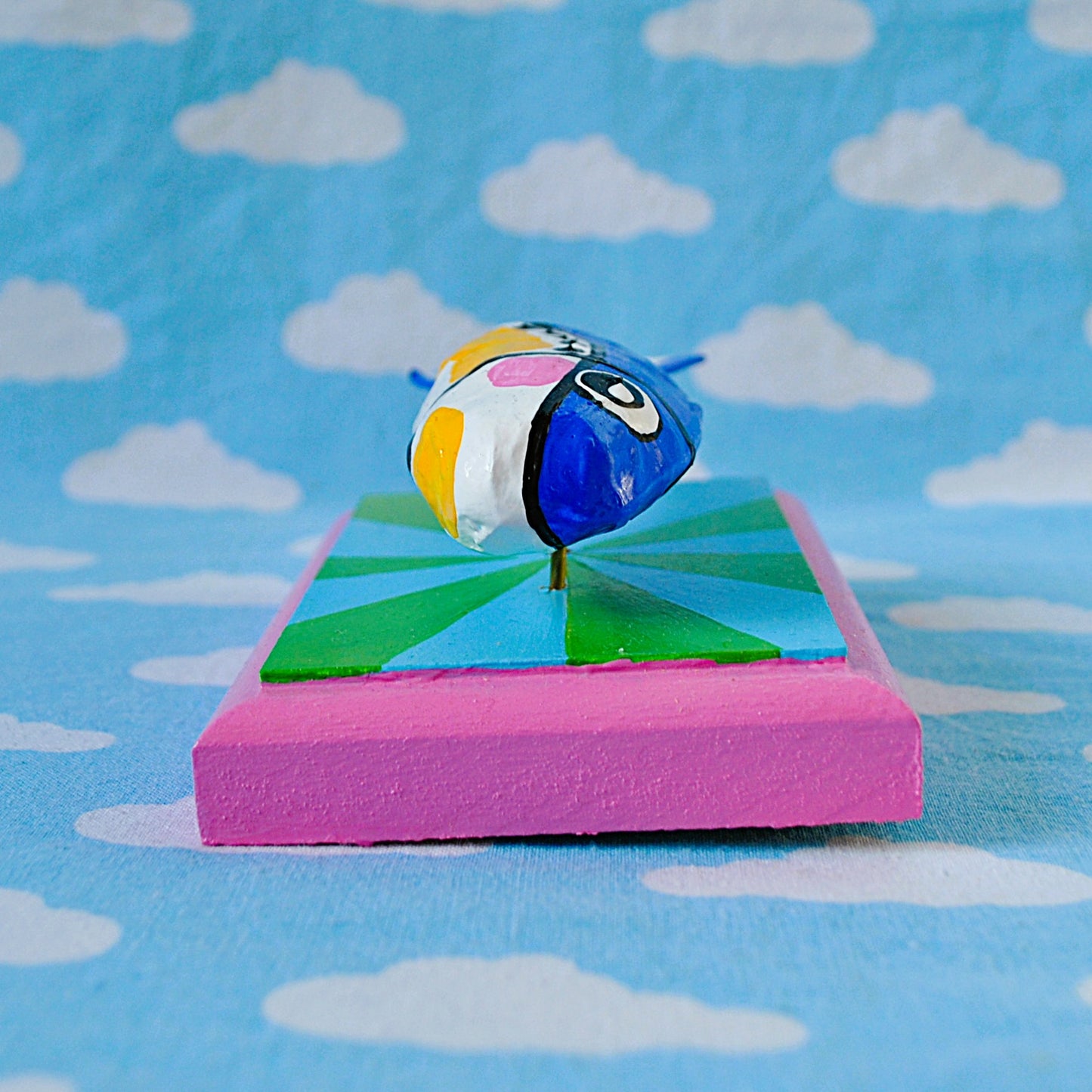 Sardine on green and blue
