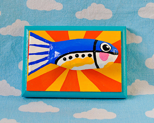 Sardine on yellow and orange