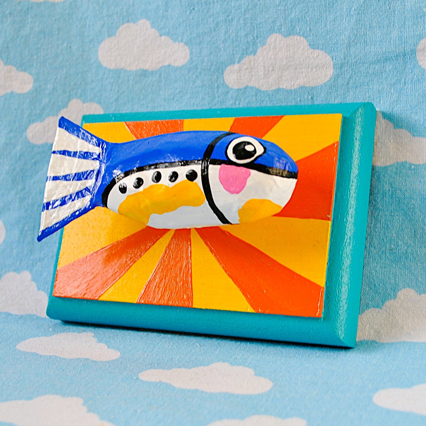 Sardine on yellow and orange