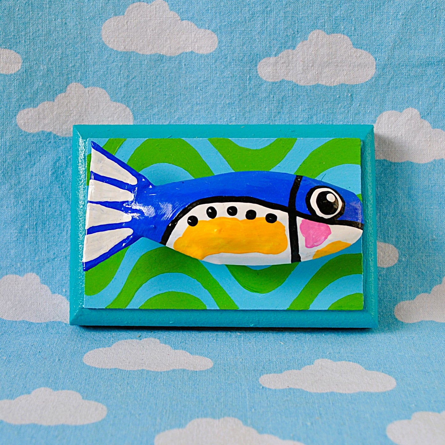 Sardine on Green and Blue waves